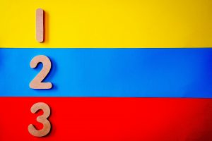 Vibrant image of numbers one, two, and three against a primary color background.